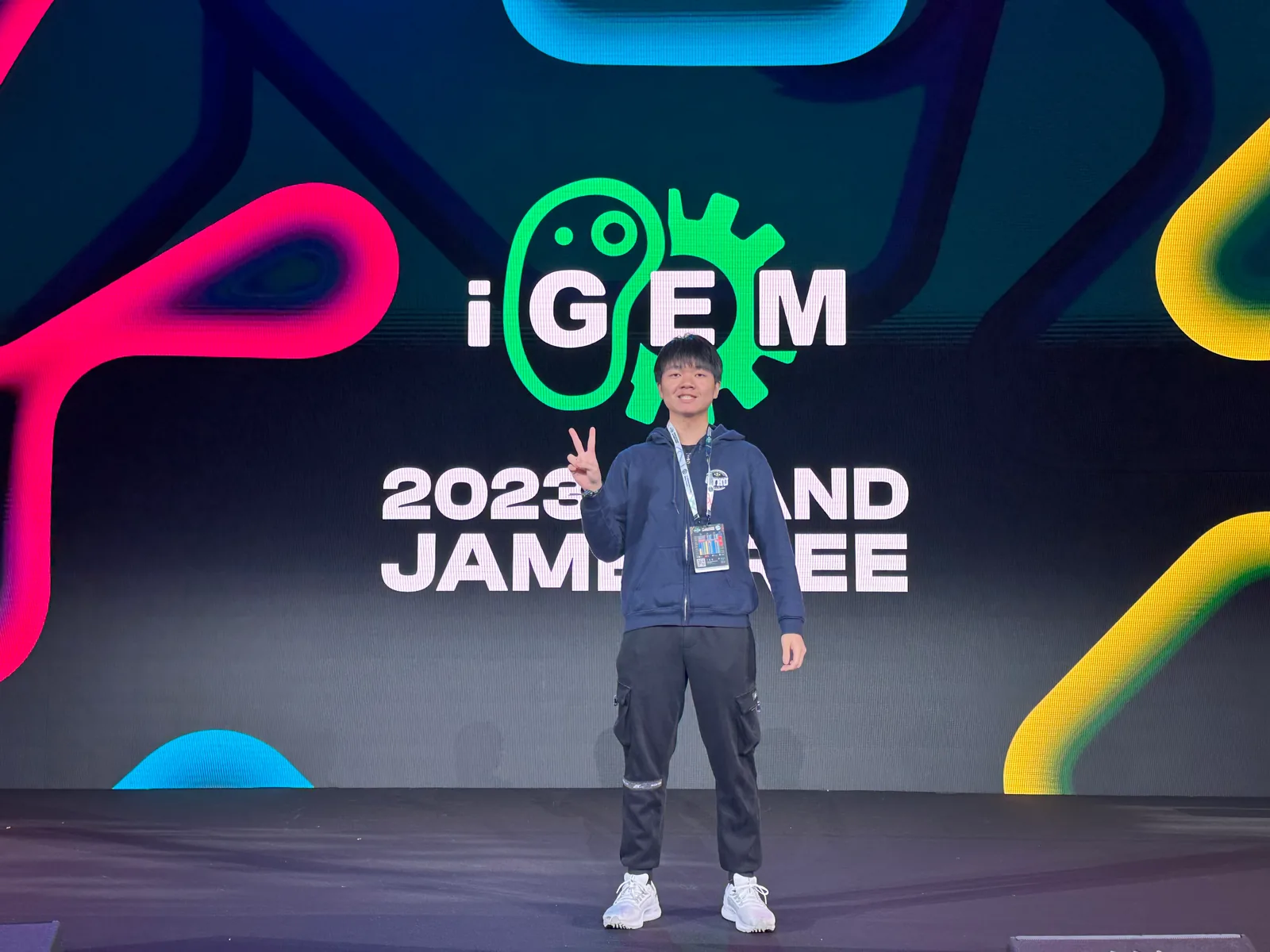 At the iGEM 2023 Grand Jamboree stage in Paris