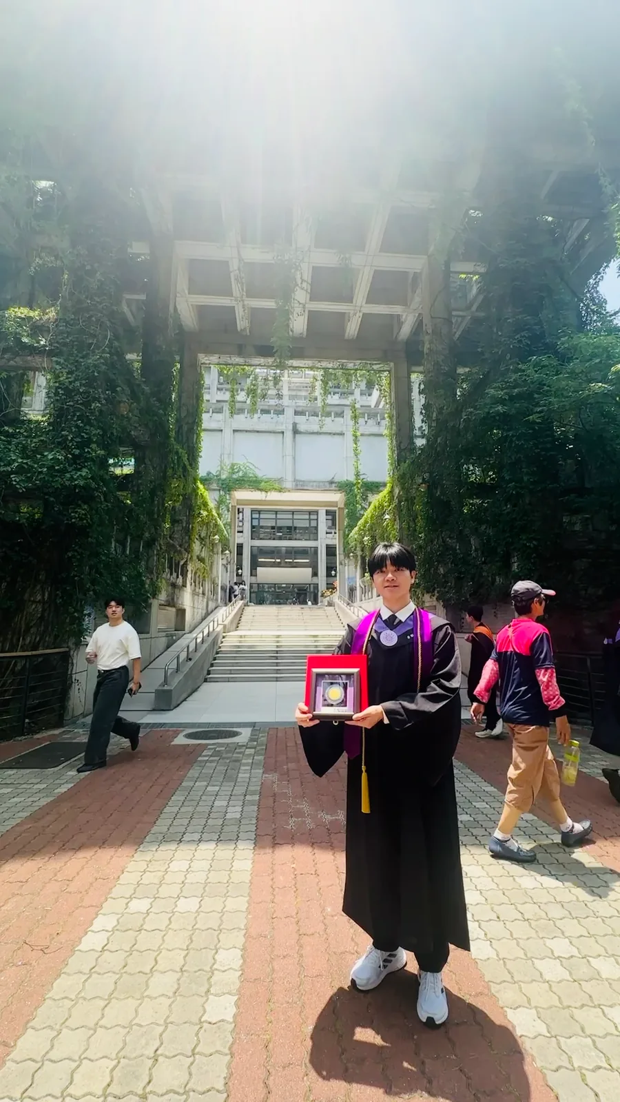 With the Mei Yi-Chi Memorial Medal at NTHU, May 2026