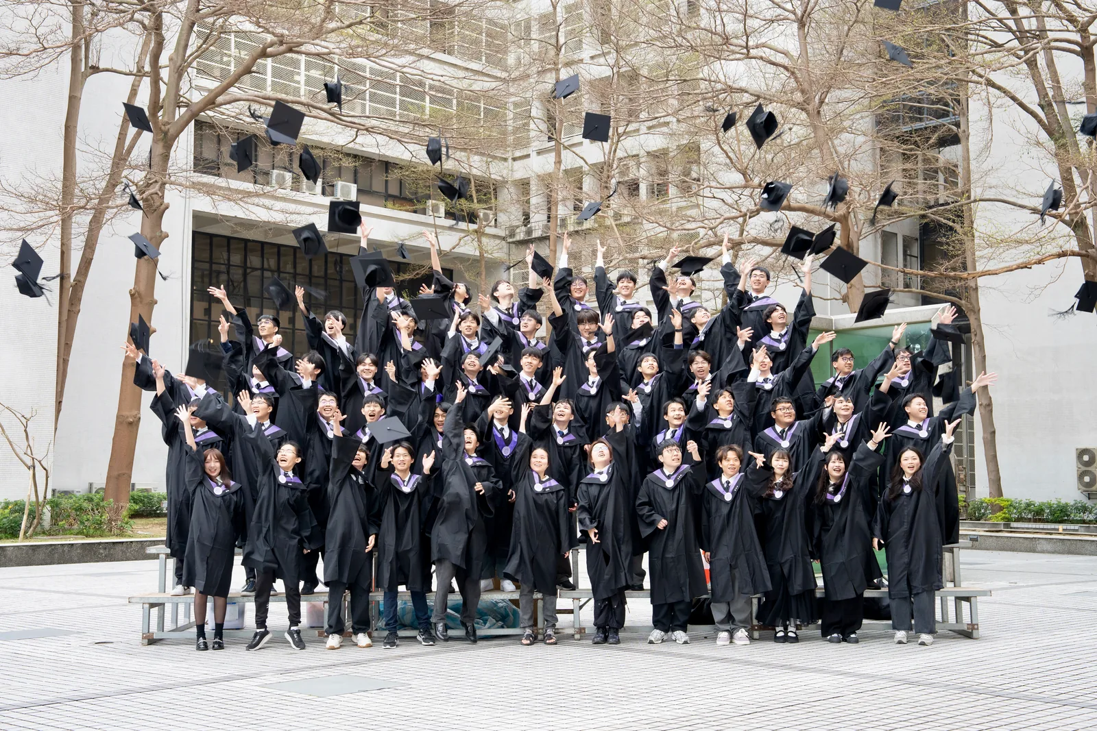 NTHU Physics graduates, one frame before the caps came down